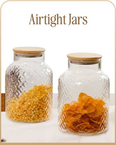 Glass airtight jars with wooden lids storing snacks and grains